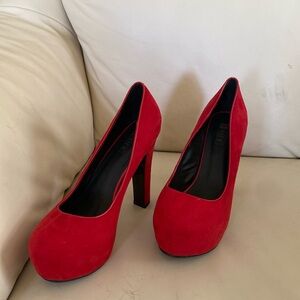 Heel red long inch brand Diufu size 9.5 (from goodwill)